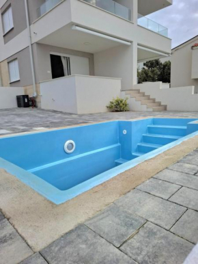 Dolphin view II with a pool by the beach